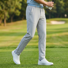 Golfer wearing ice silk golf trousers on the fairway